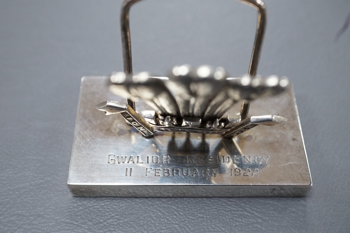 An Edwardian silver candle snuffer, possible Goldsmiths & Silversmiths Co Ltd, London, 1909, 29.9cm, a Victorian silver mounted glass cayenne pepper jar and white metal(tests as silver) menu holder, with Prince of Wales